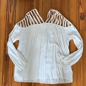 White ladder-style shoulder blouse
